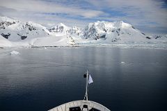 02A Arriving At Almirante Brown Station With Triangle Peak And Hauron Peak Beyond From Quark Expeditions Antarctica Cruise Ship.jpg